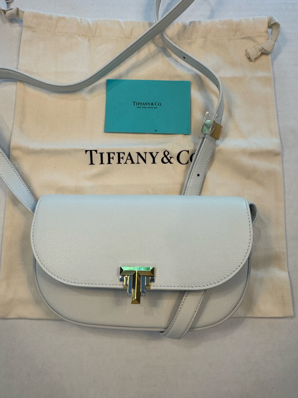 Tiffany & Co. Pebbled White Leather Crossbody with Gold-Tone Hardware